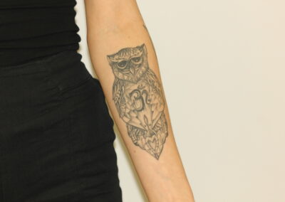 Black Forearm Owl Tattoo Before