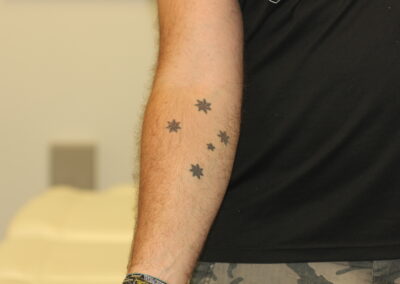 Black and Red Southern Cross Tattoo Before