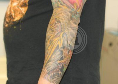 New coloured tattoo sleeve over old tattoo after laser